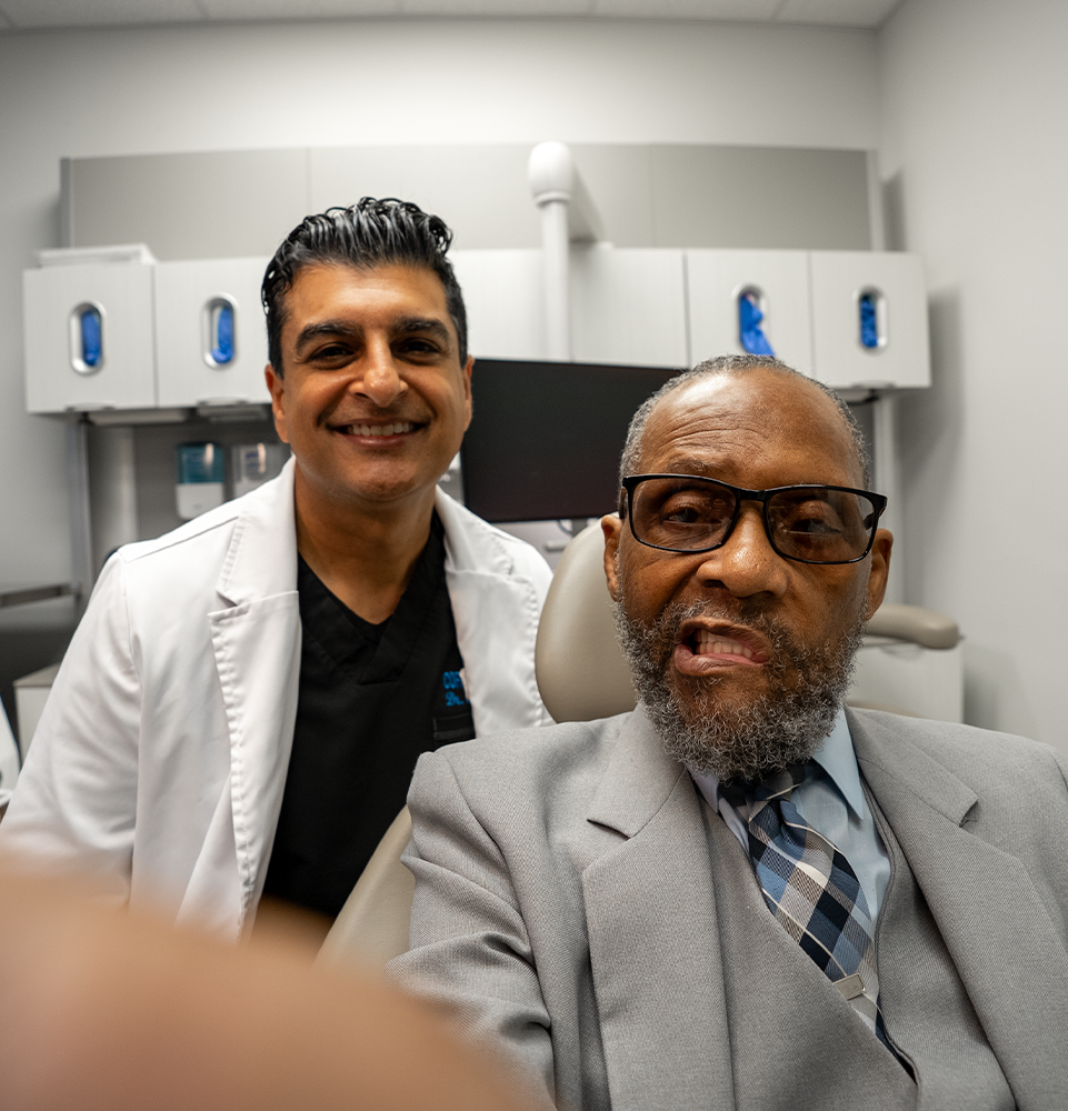 Dr. Choskey and patient taking a selfie and smiling
